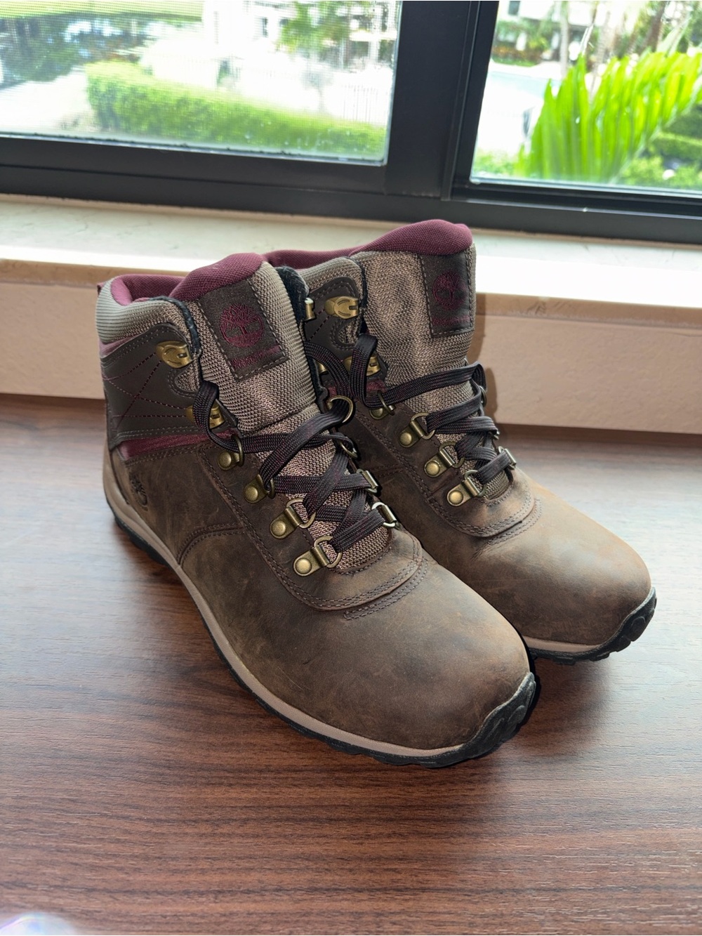 Timberlands women’s brown and burgundy hiking boots